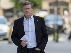 Toronto mayoral candidate John Tory arrives to unveil new plans to tackle traffic congestion problems during a press conference in Toronto, Ontario, July 17, 2014.    by Natalie Alcoba) //NATIONAL POST STAFF PHOTO