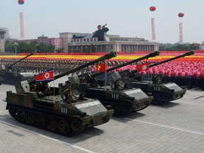 North Korean tanks seen in Kim Il-Sung square during a 2013 military parade marking the 60th anniversary of the Korean war armistice in Pyongyang.  Reports this week say one of North Korea's most modern artillery units has been moved to the border with China.