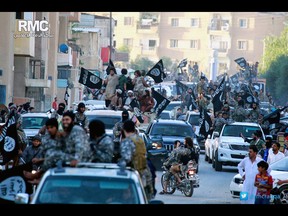AP Photo/Raqqa Media Center, File