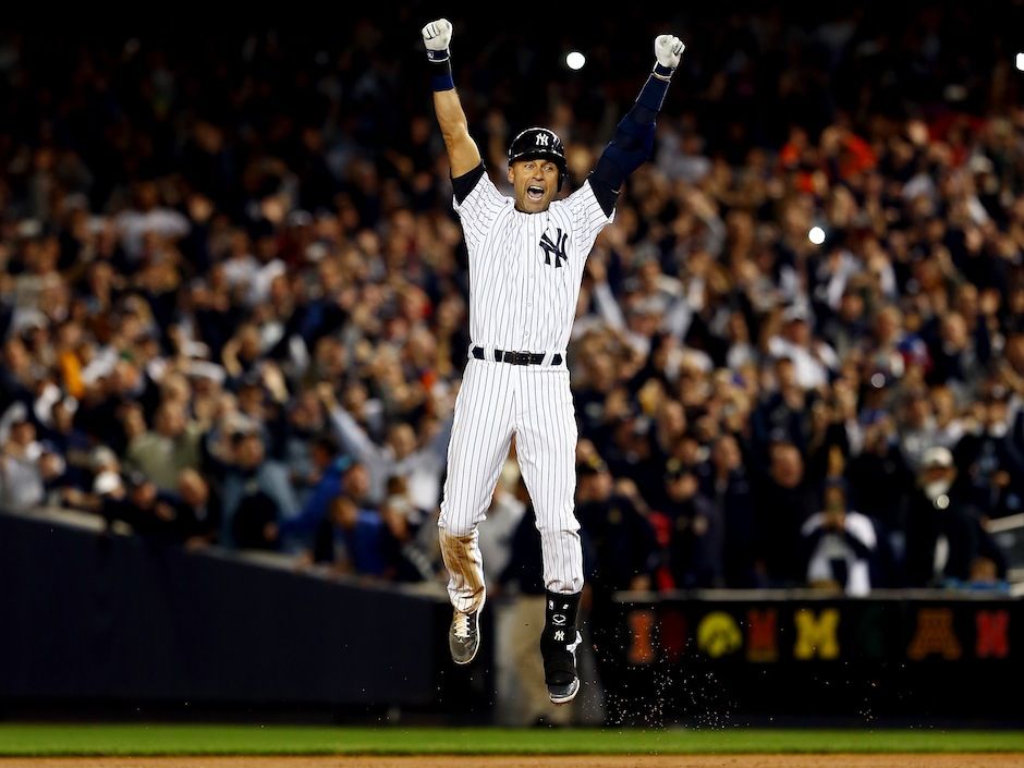 Yankees captain, Derek Jeter, waves to the fans at Fenway Park prior to  playing the last game of his career