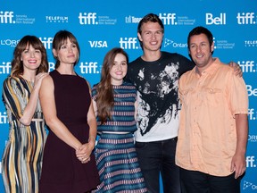Actors Rosemarie DeWitt, left, Jennifer Garner, Kaitlyn Dever, Ansel Elgort, and Adam Sandler pose for a photo at the photo call for "Men, Women, and Children" at the 2014 Toronto International Film Festival in Toronto on Saturday, Sept. 6, 2014.