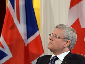 Prime Minister Stephen Haper takes part in an economic question and answer session at Mansion House in London, England on Wednesday Sept. 3, 2014.
