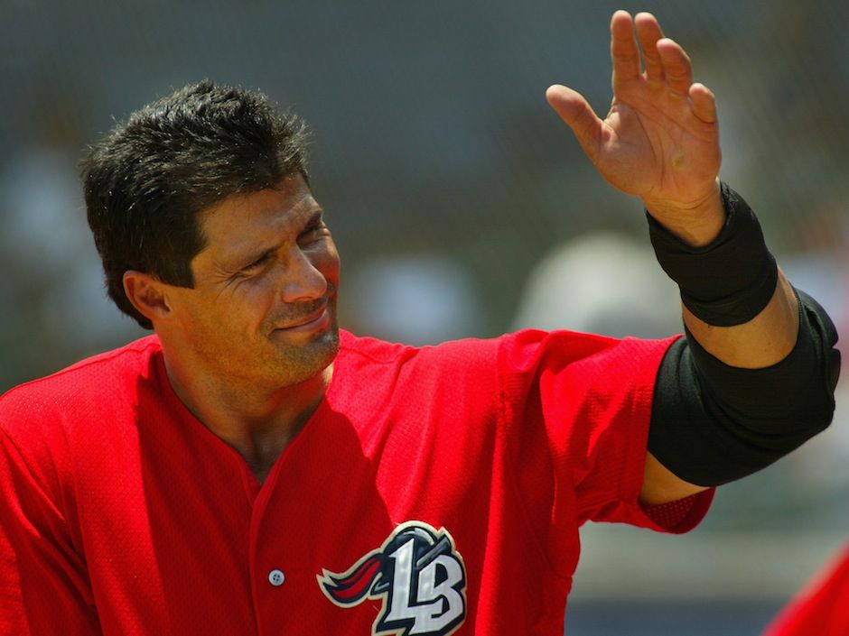 Jose Canseco Shoots Off His Middle Finger While Cleaning His Handgun