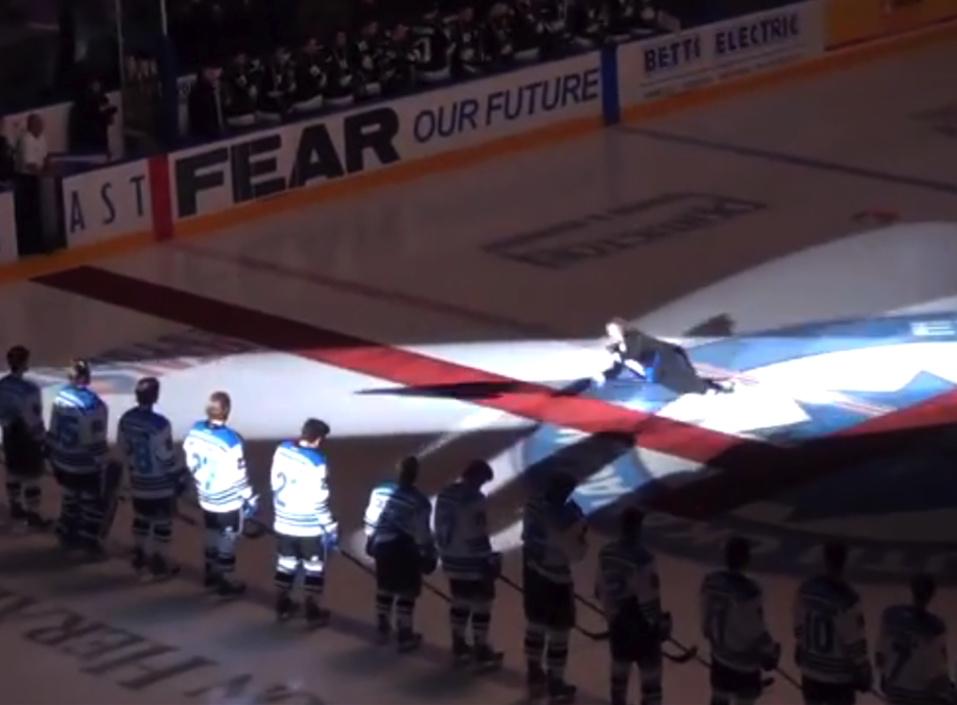 Anthem singer falls while singing 'O Canada' on skates, slides on ice