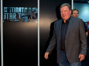 William Shatner poses for photographs during the Destination Star Trek event at ExCel on October 3, 2014 in London, England.