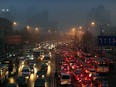 Rush hour traffic on a hazy and polluted day in Beijing in 2010. China and the U.S. — the world's two biggest polluters — announced new emissions targets on Wednesday.