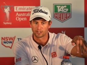 World Number three golfer Adam Scott attends a press conference before the start of the Australian Open golf tournament at the Australian Golf Club in Sydney on November 26, 2014. World Number One golfer Rory McIlroy returns to defend his Australian Open title this week with Adam Scott itching for revenge after last year's final hole anguish. AFP PHOTO / Peter PARKS IMAGE RESTRICTED TO EDITORIAL USE - STRICTLY NO COMMERCIAL USEPETER PARKS/AFP/Getty Images
