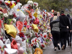 AP Photo/Elaine Thompson