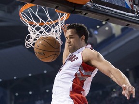 Toronto Raptors' Landry Fields scores against Golden State Warriors during first half NBA basketball action in Toronto on Sunday, March 2, 2014. THE CANADIAN PRESS/Chris Young