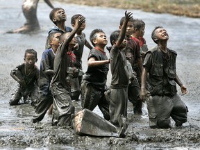 AP Photo/Eugene Hoshiko, File