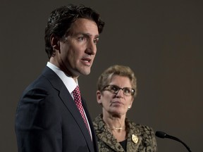 Liberal leader Justin Trudeau and Ontario Premier Kathleen Wynne take part in a joint news conference in Ottawa Thursday Jan. 29, 2015 ahead of a meeting of Canadian premiers.