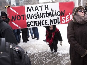 Demonstrators gather in front of Queen's Park to protest against Ontario's new sex education curriculum in February 2015.