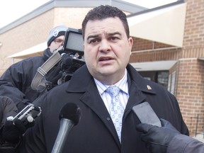 Former Conservative MP Dean Del Mastro talks to media as he leaves court for lunch break at a sentencing hearing in Peterborough Ont., Tuesday, January 27, 2015. Del Mastro was found guilty of overspending in his 2008 election campaign then trying to cover it up.