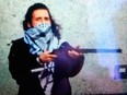 Parliament Hill shooter Michael Zehaf-Bibeau, photographed as his attack was about to begin.