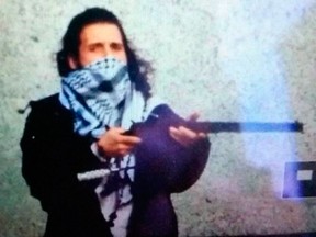 Parliament Hill shooter Michael Zehaf-Bibeau, photographed as his attack was about to begin.