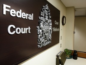 Sign in the interior reception area of the Federal Court in his downtown Ottawa (90 Sparks St.) in a file photo.