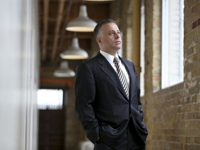 ***FREELANCE PHOTO - POSTMEDIA NETWORK USE ONLY*** TORONTO, ONT. -- JUNE 7, 2013 -- Peter Carayiannis, President and founder of Conduit Law, poses for a photo in his downtown Toronto office, June 7, 2013. His firm is an example of a new breed of small law firms that are using technology and innovative practice ideas to challenge the dominance of the big corporate law firms downtown. (Department FP Legal Post Reporter: Mitch Kowalski ) (Alex Urosevic for National Post)