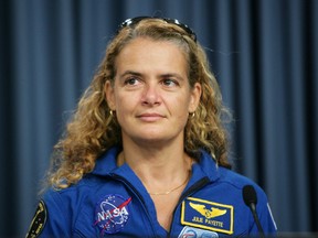 Julie Payette, of the Canadian Space Agency, addresses the media after returning to earth from a successful mission to the International Space Station at Kennedy Space Center July 31, 2009 in Cape Canaveral, Florida.