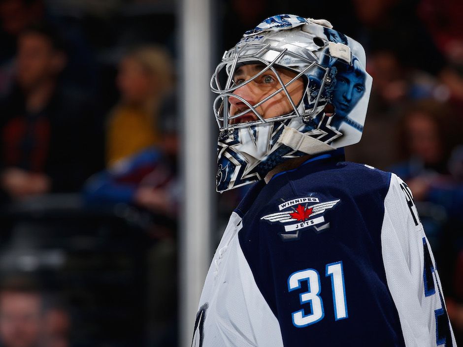 Pavelec moves on from early-season scare - The Hockey News