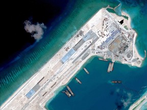 A satellite image of what is claimed to be an under-construction airstrip at Fiery Cross Reef in the Spratly Islands in the disputed South China Sea.