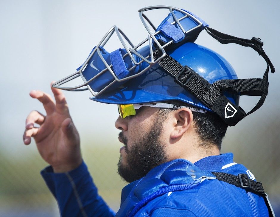 Toronto Blues Jays newly-signed catcher Russell Martin, left, and his father  Russell Martin Sr. smile after a baseball press conference in Toronto,  Thursday, Nov. 20, 2014. (AP Photo/The Canadian Press, Nathan Denette