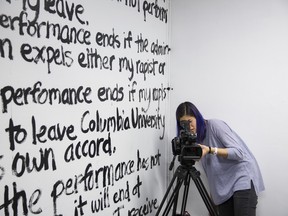 Columbia student Emma Sulkowicz prepares for part of her performance art project in New York, Dec. 11, 2014.