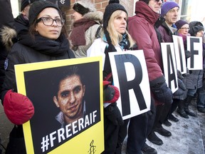 Ensaf Haidar, left, wife of blogger Raif Badawi, takes part in a rally for his freedom, January 13, 2015 in Montreal.
