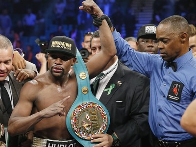Retired and fading, Floyd Mayweather still remains boxing's biggest showman  - ESPN