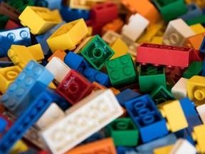 Lego bricks sit on a table in the cafeteria at the Naver Corp. headquarters in Seongnam, South Korea, on Tuesday, April 28, 2015. Naver, the parent company of Line Corp., operator of Japan's most popular instant-messaging platform, is scheduled to report first-quarter results on April 30. Photographer: SeongJoon Cho/Bloomberg