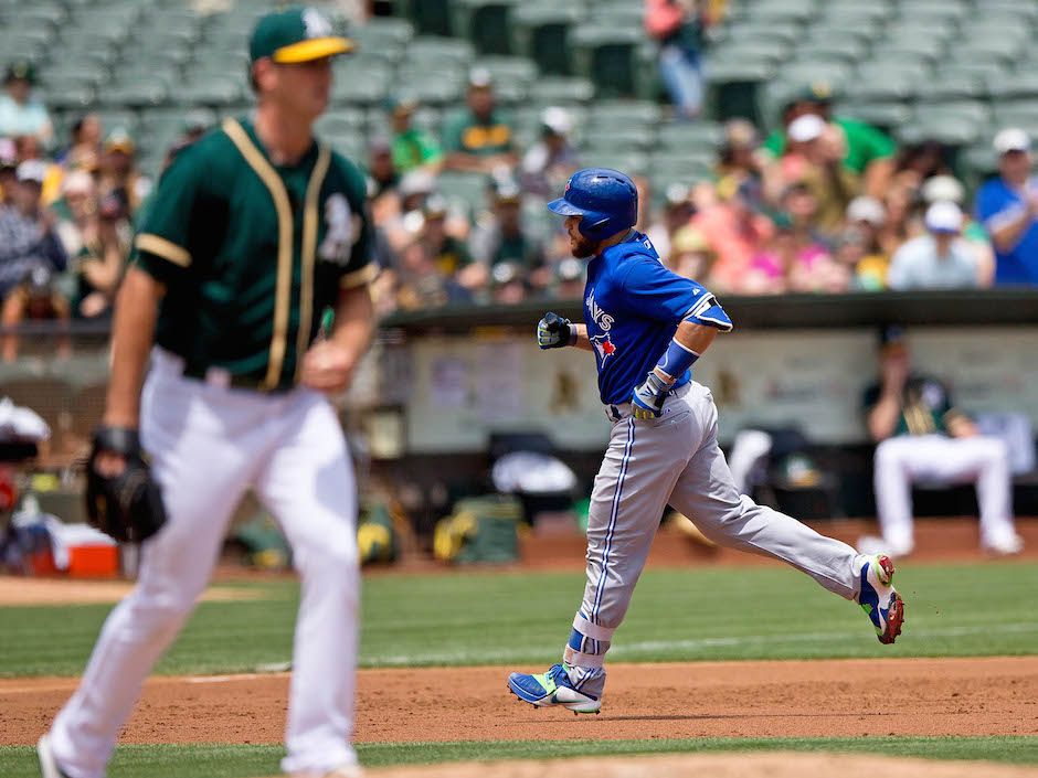 Ike Davis of the Oakland Athletics handles his equipment in the News  Photo - Getty Images