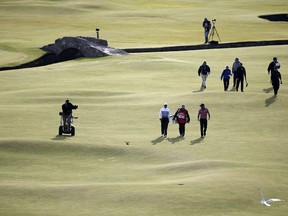 ADRIAN DENNIS/AFP/Getty Images