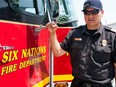Six Nations Fire Department Fire Chief Matthew Miller poses in Ohsweken, Ont., on Saturday, July 11, 2015. Miller says First Nations fire services across the country are chronically underfunded.