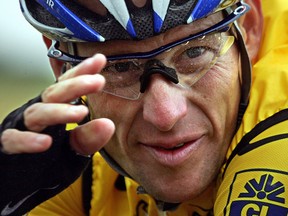 Lance Armstrong rides in the Tour de France in this July 8, 2004 file photo.