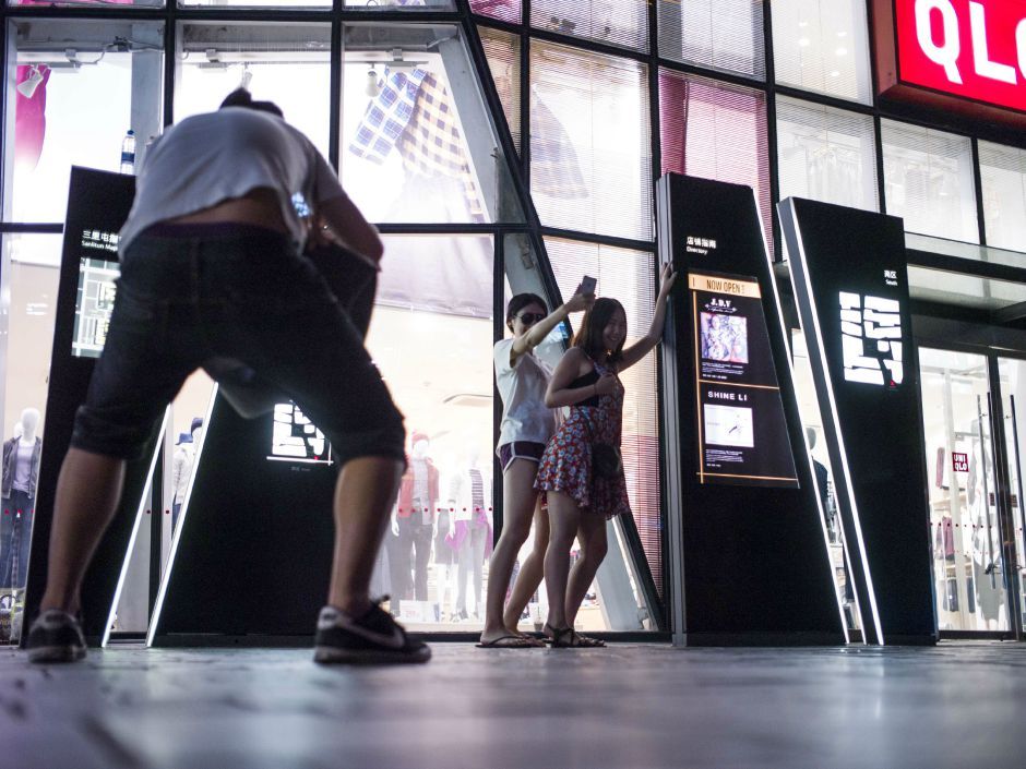 In Shopping Mall - China orders removal of amateur porn from social media after sex video  aired on giant screen in shopping mall | National Post