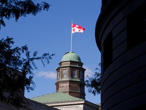 Local Input~ MONTREAL, QUE.: SEPTEMBER 27, 2012--The McGill University flag flies from the top of the Arts Building in this cityscape of McGill, pictured in Montreal on  Thursday September 27, 2012.  (Allen McInnis/THE GAZETTE) ORG XMIT: POS2013091009470554 ORG XMIT: POS1311251428166559