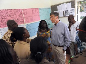 Bill Gates meets with health officials at Ahentia Health Centre in the Awutu Senya district, central region in Ghana on March 26, 2013.