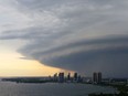 A major storm cloud moves over Etobicoke as it passes through southern Ontario on Sunday, August 2, 2015. Heavy winds and heavy rain were the subject of a severe thunderstorm watch from Environment Canada. THE CANADIAN PRESS/Donna Lypchuk