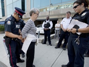 Abortion protester Linda Gibbons is arrested out front of the Morgentaler Clinic in Toronto after a silent protest in September 2015.