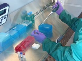 A lab worker at the JC Wilt Infectious Diseases Research centre at Canada's National Microbiology Laboratory,  in Winnipeg, Manitoba.