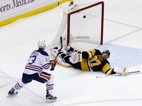 The Oilers won 3-2. (AP Photo/Gene J. Puskar)
