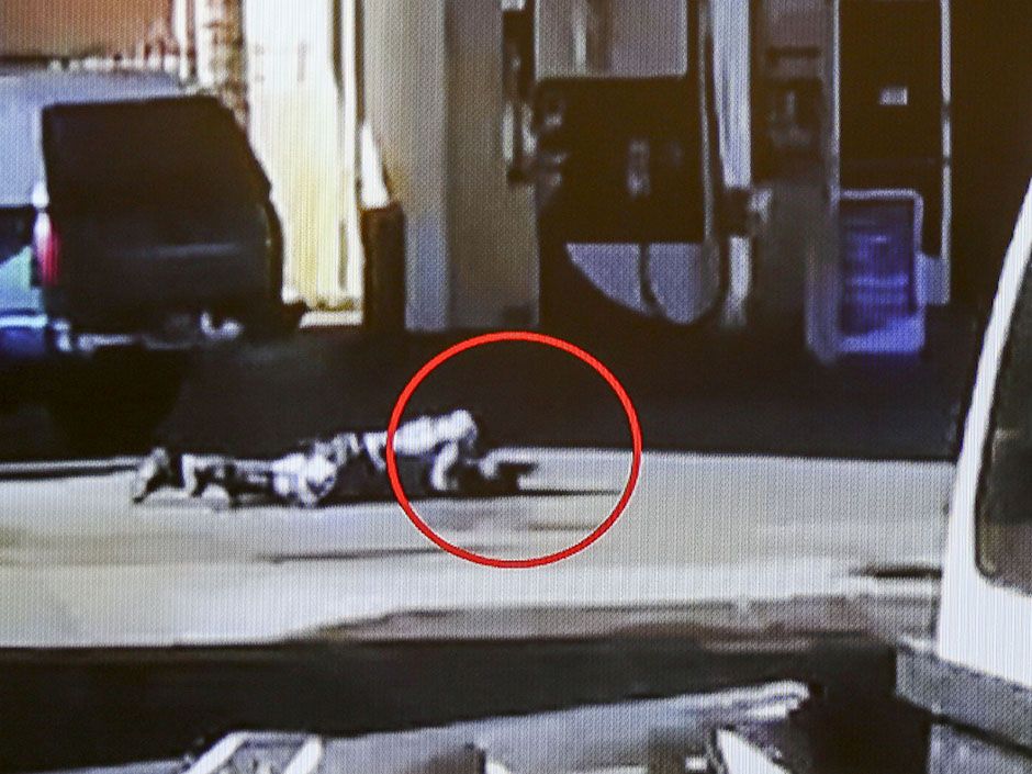 Facing Criticism, L.A. Police Release Image Of Man Crawling With Gun As ...