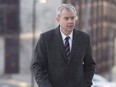Dennis Oland heads to the Law Courts in Saint John, N.B., on October 21, 2015.