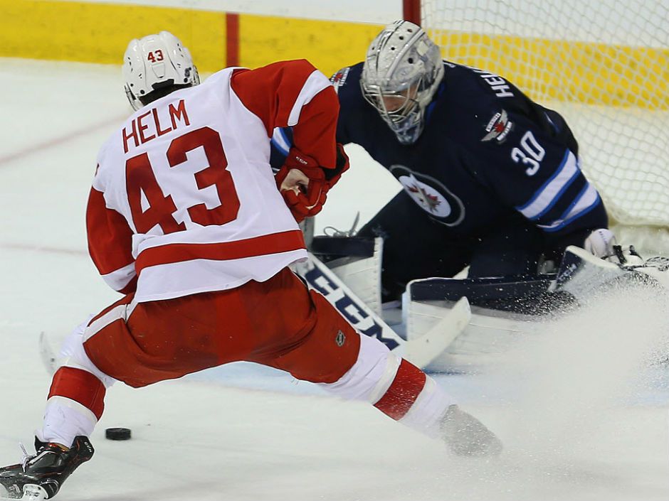 Connor Hellebuyck stops 33 shots, Jets beat Red Wings 3-0