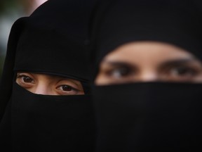 Two women wearing niqabs in London, England
