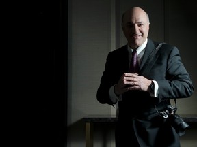 Television personality Kevin O'Leary with his Sony 7R camera at Toronto's One Restaurant in Yorkville, Friday December 19, 2014.