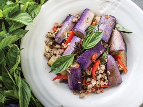 Deep-frying the eggplant ever-so-briefly helps to brighten its lovely purple skin colour. As seen in Pailin Chongchitnant’s Eggplant Stir-Fry with Thai Basil (Pad Makeua Yao) from Hot Thai Kitchen.
