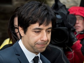 Former CBC Radio host Jian Ghomeshi leaves court after being found not guilty on sex assault charges on March 24, 2016.