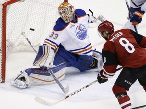Arizona Coyotes' Tobias Rieder scores a goal against Edmonton Oilers' Cam Talbot during the second period of the Coyotes' 4-2 win in Glendale, Ariz., on Tuesday.
