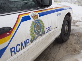 An RCMP cruiser in a file photo. Mounties on Friday found four people dead in a home in remote interior B.C.