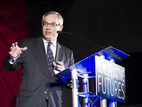 Conservative MP and former Treasury Board President Tony Clement addresses party members at the Conservative Future Conference in Barrie, Ont. in March. He has since announced his candidate for the Conservative Party leadership.